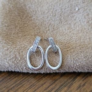 White ice brand earrings